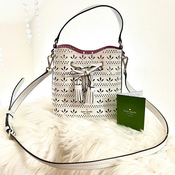 kate spade Handbags - RESERVED NWOT Kate Spade White Drawstring Leather Bucket Crossbody Handbag